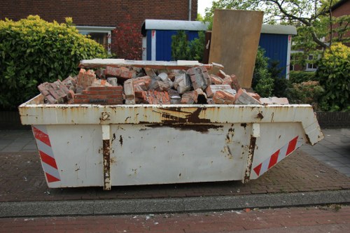 Wood Green Skip Hire team assisting a customer with skip selection