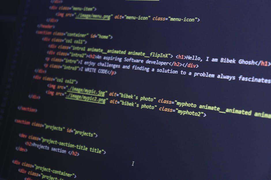 A close-up view of a computer screen displaying lines of HTML code in a dark-themed editor. The code contains tags such as <head>, <body>, <header>, and <div>, with syntax highlighted in various color